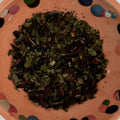 Lillian's Blushing Bonnie loose tea in a terracotta dish