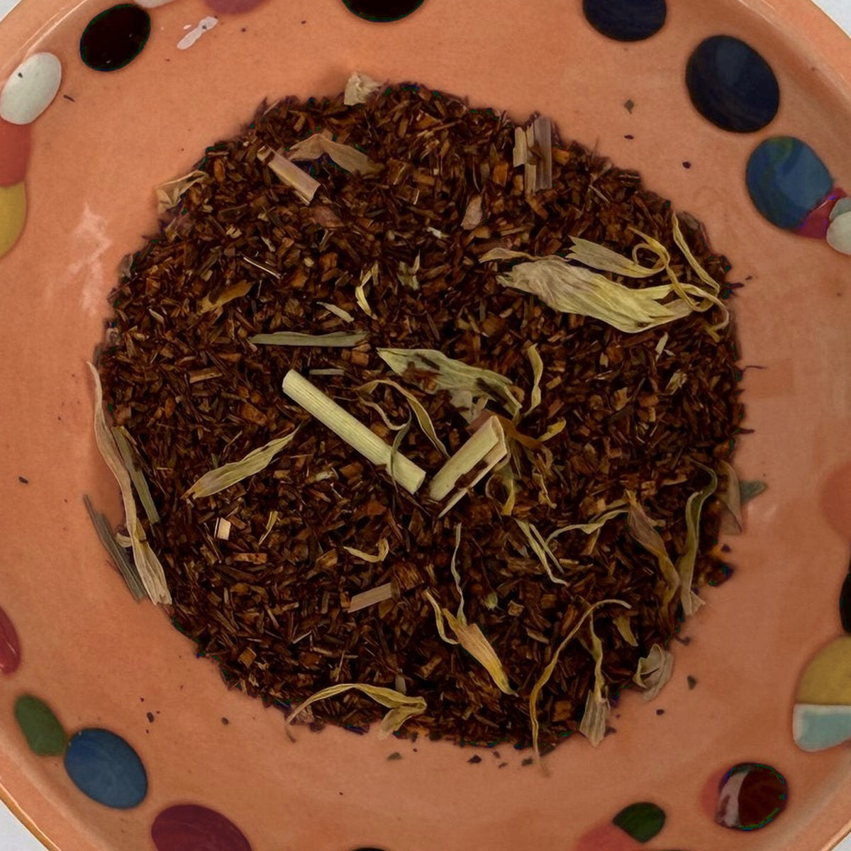 Lillian's Lemon Cloud loose tea in a terracotta dish