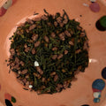 The Puca's Genmaicha loose tea in a terracotta dish