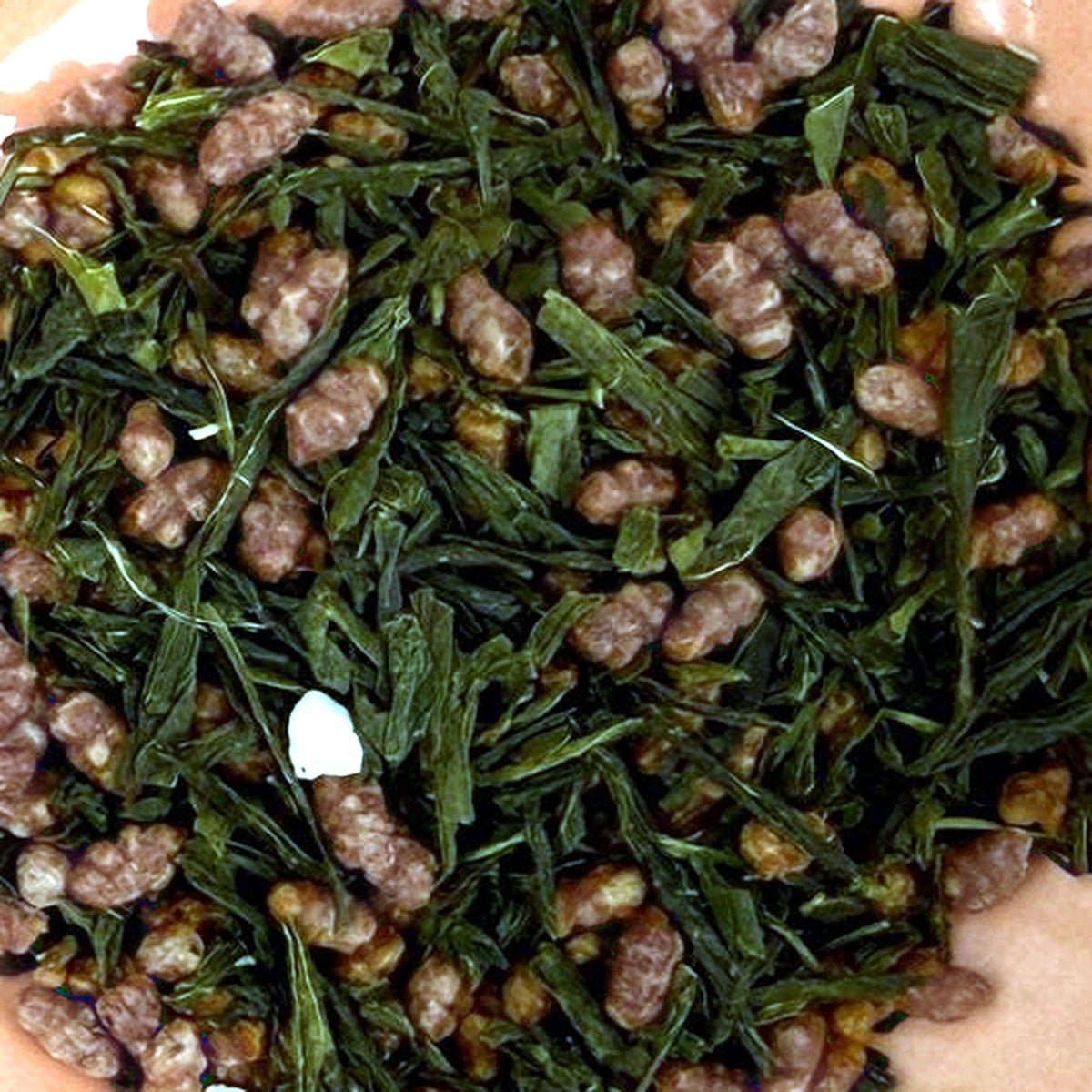 Close-up of The Púca's Genmaicha loose tea leaves